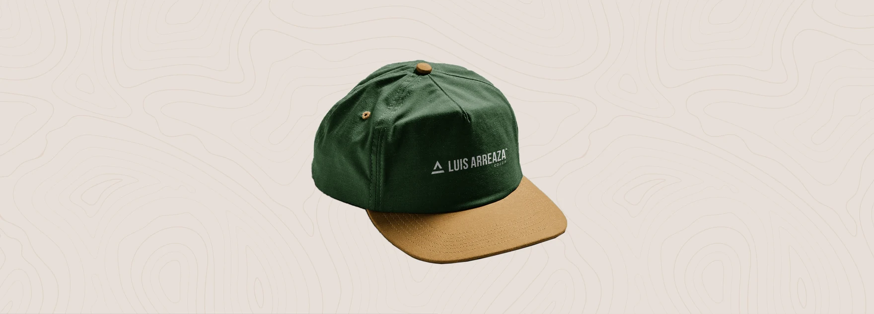 Green and tan cap with the Luis Arreaza logo