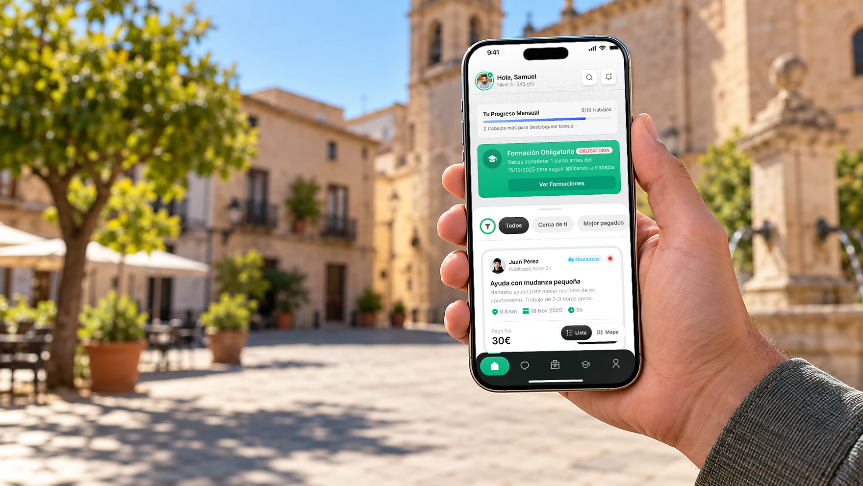 Microjob app on an iPhone held in a sunny town square