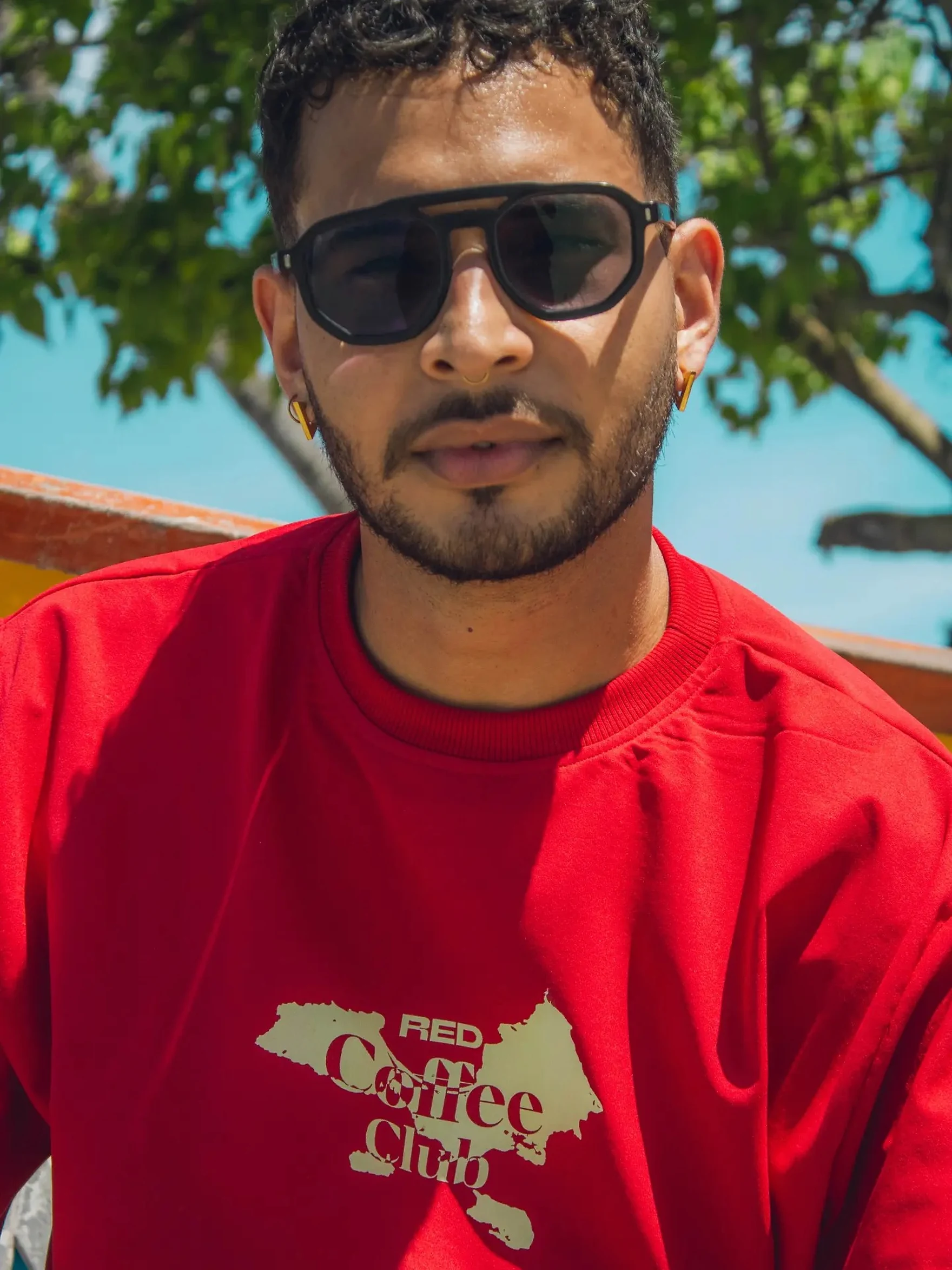 RED Coffee Club merch by the sea