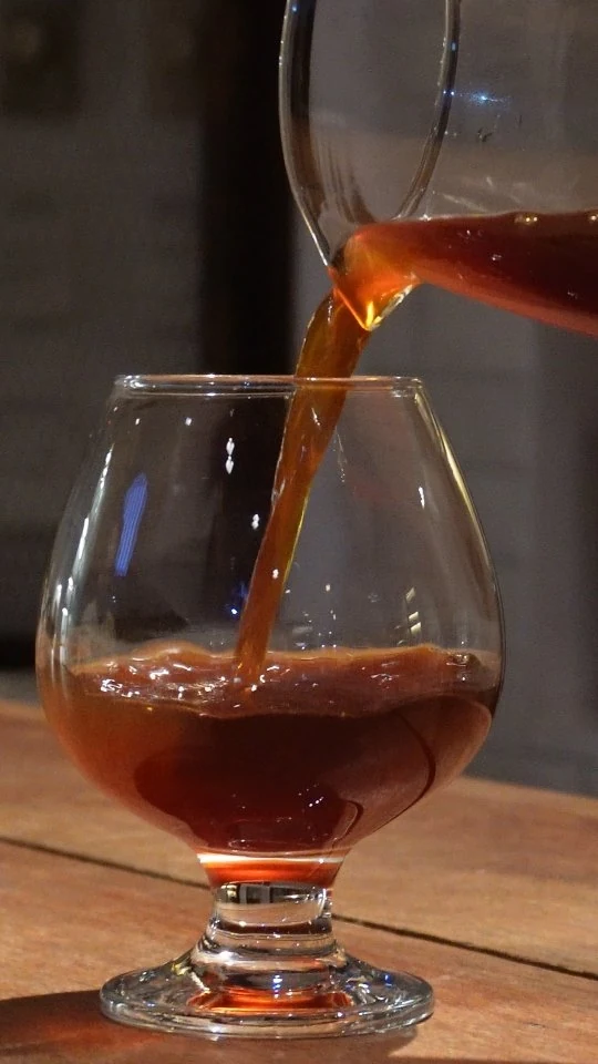 Coffee poured into a glass